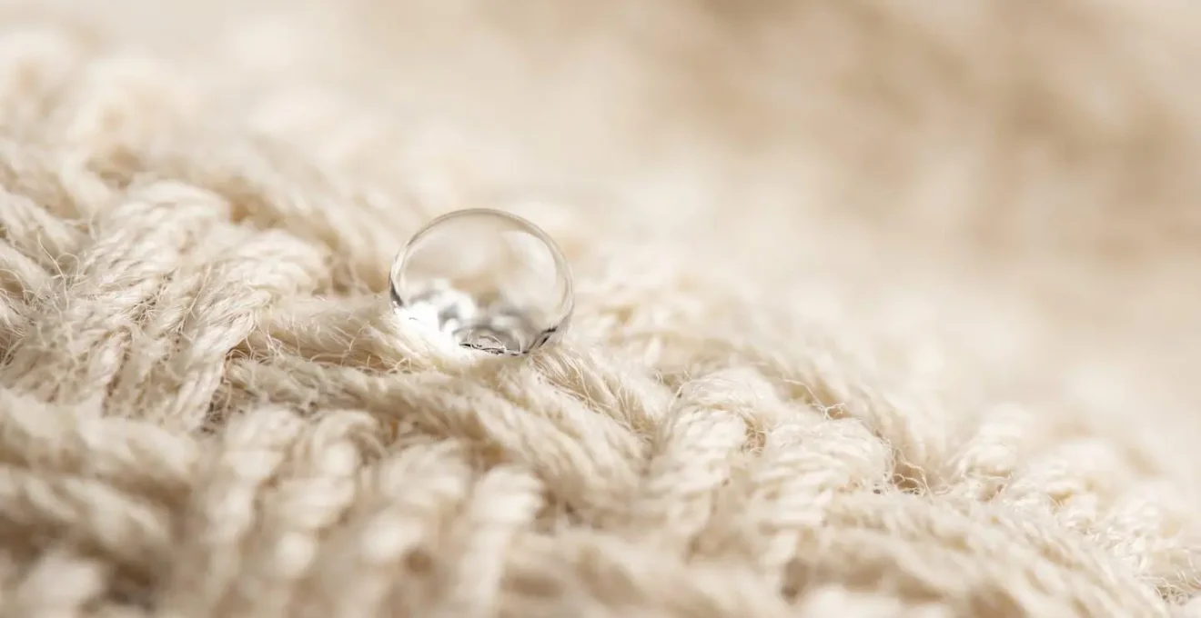 Extreme close-up of soft organic cotton material showing natural fiber texture