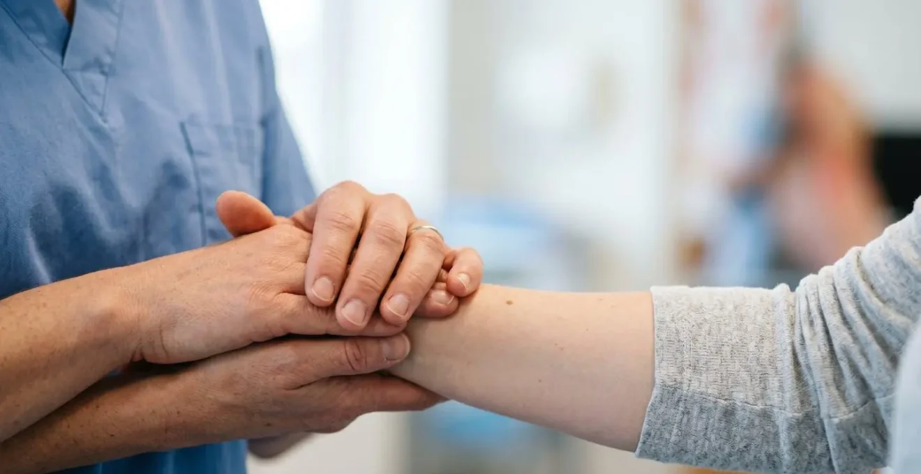 Soft-focus representation of clinical prenatal care environment emphasizing reassurance and wellbeing